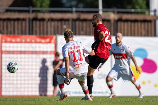 Fabian Eisele (SG Sonnenhof Großaspach, No. 23) in a tackle with Georg Strauch (Fortuna Köln, No. 11), SG Sonnenhof Großaspach vs. Fortuna Köln, soccer, 3rd Division, Matchday 1, August 8, 2026, DFB regulations prohibit any use of photographs as image sequences and or quasi-video. Aspach, Baden-Württemberg, Germany Copyright: xkolbert-press PhilipxZieglerx