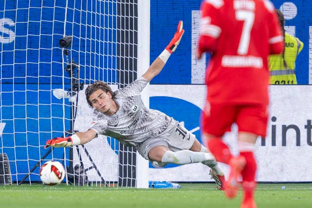 August 8, 2026 Soccer, 2. Bundesliga: VfL Wolfsburg vs. 1. FC Kaiserslautern, Matchday 1 at the Volkswagen Arena. Goalkeeper Jakub Zielinski of VfL Wolfsburg saves a shot. IMPORTANT NOTICE: In accordance with DFL and DFB regulations, it is prohibited to use or allow the use of photographs taken in the stadium and or during the match in the form of sequential images and or video-like photo series Copyright: xDavidxInderliedx
