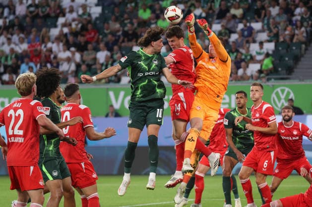 August 8, 2026, xgox, Soccer, 2. Bundesliga, VfL Wolfsburg 1 FC Kaiserslautern v l Fraser Hornby (Wolfsburg), 10 Jacob Rasmussen (Kaiserslautern), 14 Kamil Grabara (Wolfsburg), 1 tackle, duel, battle, DFL DFB REGULATIONS PROHIBIT ANY USE OF PHOTOGRAPHS as IMAGE SEQUENCES and or QUASI-VIDEO Wolfsburg