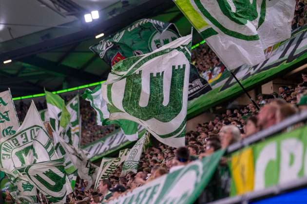 August 8, 2026 Soccer, 2. Bundesliga: VfL Wolfsburg vs. 1. FC Kaiserslautern, Matchday 1 at the Volkswagen Arena. Wolfsburg fans wave their flags. IMPORTANT NOTICE: In accordance with DFL and DFB regulations, it is prohibited to to use or allow the use of photographs taken in the stadium and or during the game in the form of sequential images and or video-like photo sequences Copyright: xDavidxInderliedx