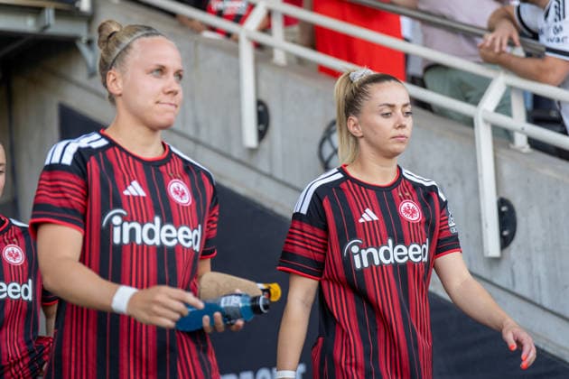 August 8, 2026, xhfmx, Soccer UEFA WCLQ, Eintracht Frankfurt vs. Malmö FF: Pia Sophie Wolter (Eintracht Frankfurt, 17) and Nina Lührßen (Eintracht Frankfurt, 11) on their way to the field. DFL and DFB regulations prohibit any use of photographs as image sequences and or quasi-video. Frankfurt