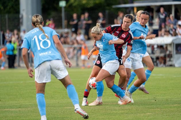 August 8, 2026, xhfmx, Soccer UEFA WCLQ, Eintracht Frankfurt vs. Malmö FF, Larissa Mühlhaus of Eintracht Frankfurt, age 47, in a tackle with opponents. DFL and DFB regulations prohibit any use of photographs as image sequences and or quasi-video. Frankfurt