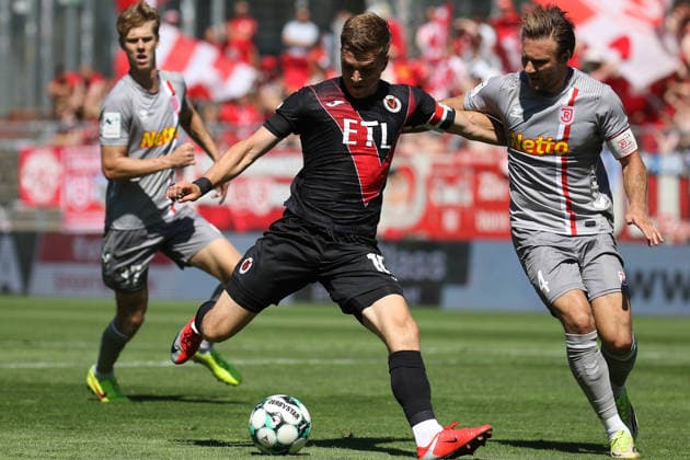 August 8, 2026, xsefx, Soccer, FC Viktoria Köln vs. SSV Jahn Regensburg, 3. Liga, Sportpark Höhenberg, Matchday 1, 2026–2027 Season: David Otto of FC Viktoria Köln battles for the ball against Felix Strauss of SSV Jahn Regensburg 04. DFB regulations prohibit any use of photographs as image sequences and or quasi-video. North Rhine-Westphalia, Germany