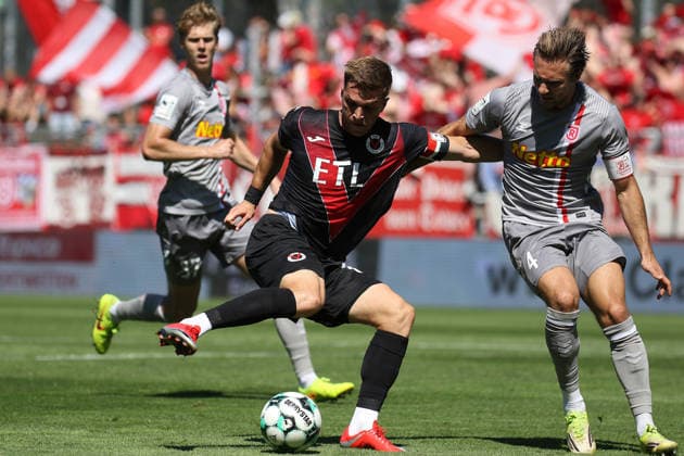 August 8, 2026, xsefx, Soccer, FC Viktoria Köln vs. SSV Jahn Regensburg, 3. Liga, Sportpark Höhenberg, Matchday 1, 2026–2027 Season: David Otto of FC Viktoria Köln battles for the ball against Felix Strauss of SSV Jahn Regensburg 04. DFB regulations prohibit any use of photographs as image sequences and or quasi-video. North Rhine-Westphalia, Germany