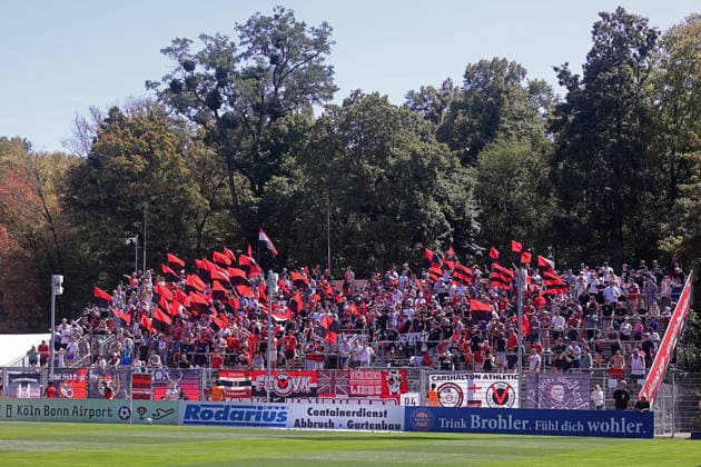 August 8, 2026, xsefx, Soccer, FC Viktoria Köln vs. SSV Jahn Regensburg, 3. Liga, Sportpark Höhenberg, Matchday 1, 2026–2027 season: FC Viktoria Köln fans wave flags in honor of Günter Pütz, former president of FC Viktoria Köln 1904 e.V. DFB regulations prohibit any use of photographs as image sequences and or quasi-video. North Rhine-Westphalia, Germany