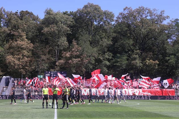 August 8, 2026, xsefx, Soccer, FC Viktoria Köln vs. SSV Jahn Regensburg, 3. Liga, Sportpark Höhenberg, Matchday 1, 2026–2027 season; away section with SSV Jahn Regensburg fans holding flags. DFB regulations prohibit any use of photographs as image sequences and or quasi-video. North Rhine-Westphalia, Germany