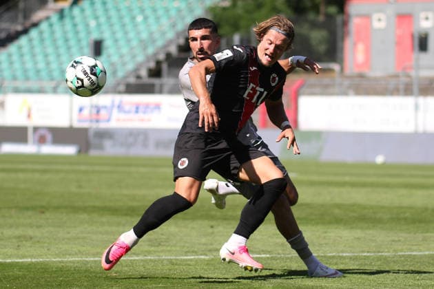 August 8, 2026, xsefx, Soccer, FC Viktoria Köln vs. SSV Jahn Regensburg, 3. Liga, Sportpark Höhenberg, Matchday 1, 2026–2027 Season: Tobias Eisenhuth of FC Viktoria Köln 06 in a tackle against Nassim Boujellab of Jahn Regensburg. 10. DFB regulations prohibit any use of photographs as image sequences and or quasi-video. North Rhine-Westphalia, Germany