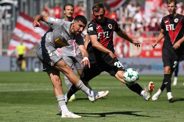 August 8, 2026, xsefx, Soccer, FC Viktoria Köln vs. SSV Jahn Regensburg, 3. Liga, Sportpark Höhenberg, Matchday 1, 2026–2027 Season: Nassim Boujellab (Jahn Regensburg) No. 10 in a tackle against Kilian Jakob (FC Viktoria Köln) No. 26. DFB regulations prohibit any use of photographs as image sequences and or quasi-video. North Rhine-Westphalia, Germany