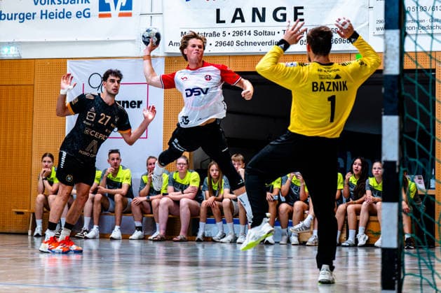 August 9, 2026, xdobgx, 2026 Heide Cup Handball, HOJ Elite Provence Aix vs. Nikoloz Kalandadze PAUC Handball, 27, Lukas Karlskov HoJ Elite, 15 on a shot, in action, throwing, Joze Baznik PAUC Handball, 1 Schneverdingen