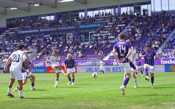 Scoring chance for Alexander Dikarev of BFC Preussen, whose shot is saved by goalkeeper Max Uhlig of Aue. Northeast Regional League 2026-27: FC Erzgebirge Aue vs. BFC Preussen on August 9, 2026. Erzgebirge Aue vs. BFC Preussen