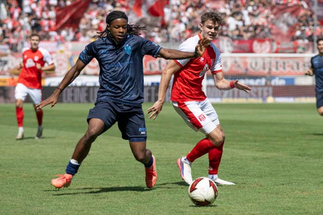 Regionalliga Northeast, Season 26–27: Hallescher FC vs. Chemnitzer FC, Halle, Germany, August 9, 2026. Pictured, from left: Ken Tchouangue (Chemnitz) and Fabrice Hartmann (Halle). Halle-Saale, Leuna Chemie Stadium, Saxony-Anhalt, Germany