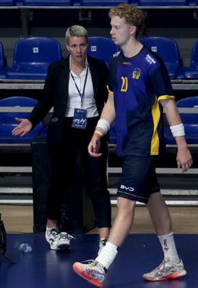 09.08.2026 Belgrade Sweden-Serbia European U18 men s handball championship final tournament match for 13-16 place Vanja Antic(L) local organiser EHF handball referee after suspension says to going outside of field Daniel Sandberg(R) Sweden :