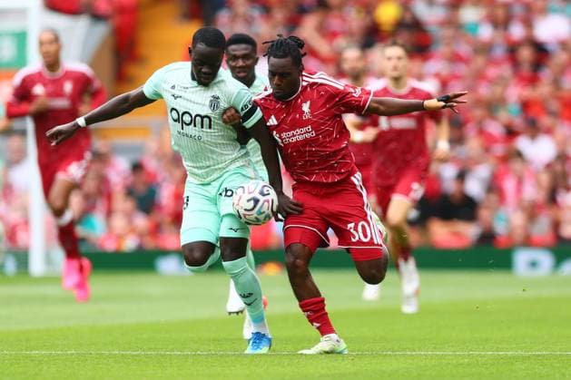 Pape Cabral of Monaco and Jeremie Frimpong of Liverpool Liverpool v Monaco, Pre Season Friendly, Football, Anfield, Liverpool, UK - 09 Aug 2026Liverpool Anfield United Kingdom EDITORIAL USE ONLY No use with unauthorised audio, video, data, fixture lists, club league logos or live services. Online in-match use limited to 120 images, no video emulation. No use in betting, games or single club league player publications. Copyright: xPaulxCurrie Shutterstockx 17051142r