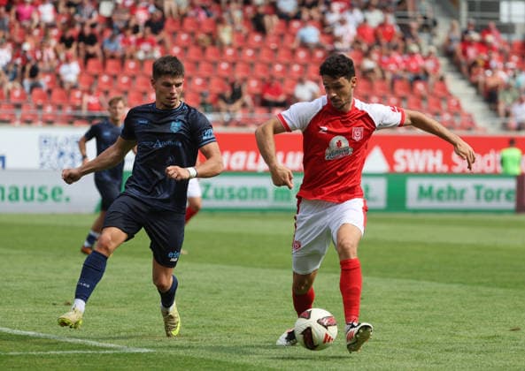 090826 Halle, Saale, Saxony-Anhalt; Sports; Soccer; Hallescher FC Halle (HFC); Northeast Regional League (4th Division); Men s; 2026–2027 Season; Matchday 4; Hallescher FC vs. CFC Chemnitzer FC; Maurizio Grimaldi (Chemnitzer FC); Niklas Landgraf (Hallescher FC)