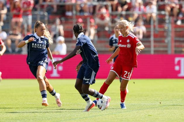 Pernille Harder of FC Bayern Munich, 21, with the ball, alongside Mylene Chavas of Paris FC, 18, GER, FC Bayern Munich vs. Paris FC, soccer, friendly match, 2026–2027 season, August 9, 2026, GER, FC Bayern Munich vs. Paris FC, soccer, friendly match, 2026–2027 season, August 9, 2026, Unterhaching Copyright: xEibner-Pressefoto JennixMaulx EP_JML