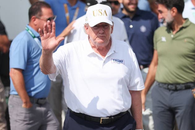BEDMINSTER, NJ - AUGUST 09: President Donald Trump walks out of the clubhouse at Bedminster before the forth round of LIV Golf New York on August 9, 2026 at Trump National Golf Club in Bedminster, New Jersey. (Photo by Andrew Mordzynski Icon Sportswire) GOLF: AUG 09 LIV Golf New York EDITORIAL USE ONLY Icon2608098162831
