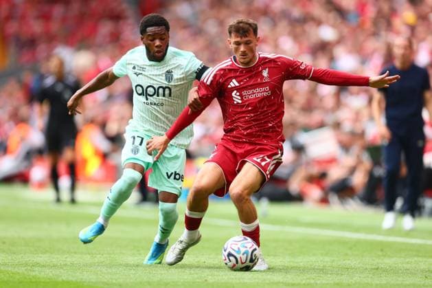 Stanis Idumbo of Monaco and Calvin Ramsay of Liverpool Liverpool v Monaco, Pre Season Friendly, Football, Anfield, Liverpool, UK - 09 Aug 2026Liverpool Anfield United Kingdom EDITORIAL USE ONLY No use with unauthorised audio, video, data, fixture lists, club league logos or live services. Online in-match use limited to 120 images, no video emulation. No use in betting, games or single club league player publications. Copyright: xPaulxCurrie Shutterstockx 17051142fa