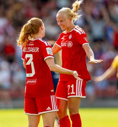 August 9, 2026, Google Pixel Women s Bundesliga Friendly Match: FC Bayern Women vs. Paris FC, at Sportpark Unterhaching; Pernille Harder (right), FC Bayern Munich, celebrating a goal with Stine Ballisager, FC Bayern Munich