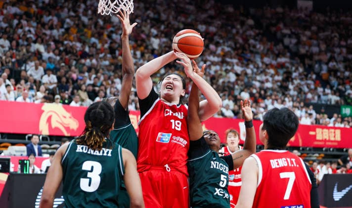 (260809) -- HAIKOU, Aug. 9, 2026 -- Zhang Ziyu (C) of China competes during a friendly basketball match between China and Nigeria in Haikou, south China s Hainan Province, Aug. 9, 2026. ) (SP)CHINA-HAIKOU-BASKETBALL-FRIENDLY-CHINA VS NIGERIA (CN) YangxGuanyu 