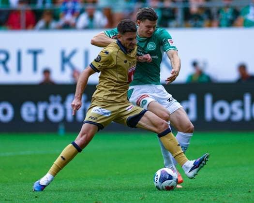August 9, 2026, Soccer, Brack Super League 2026–27, Round 3, FC St. Gallen 1879 vs. FC Lucerne, Berit Sitter Stadium, St. Gallen, Switzerland; Stefan Knezevic 5, FC Lucerne defends against Andrin Hunziker 9, FC St. Gallen 1879; Photo by Urs Ottiger