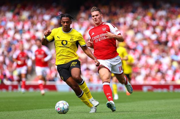 Filippo Mane of Borussia Dortmund and Viktor Gyokeres of Arsenal chase the ball during the preseason friendly match between Arsenal FC and Borussia Dortmund at Emirates Stadium on August 9, 2026, in London, England. Photo by Ryan Crockett, DeFodi Images