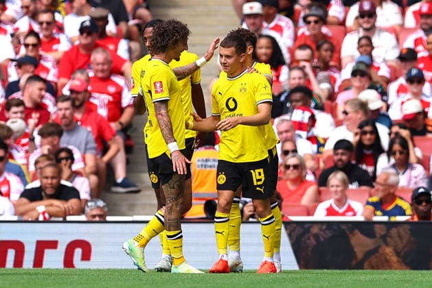 Konstantinos Karetsas of Borussia Dortmund celebrates his goal—his team s second—during the preseason friendly match between Arsenal FC and Borussia Dortmund at Emirates Stadium on August 9, 2026, in London, England. Photo by Ryan Crockett, DeFodi Images