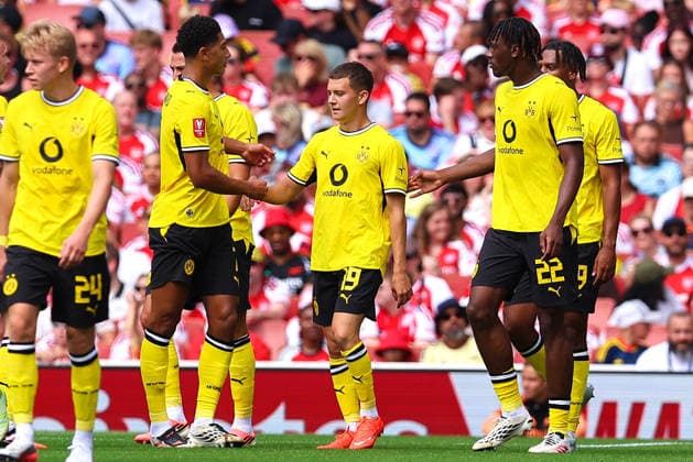 Konstantinos Karetsas of Borussia Dortmund celebrates his goal—his team s second—during the preseason friendly match between Arsenal FC and Borussia Dortmund at Emirates Stadium on August 9, 2026, in London, England. Photo by Ryan Crockett, DeFodi Images