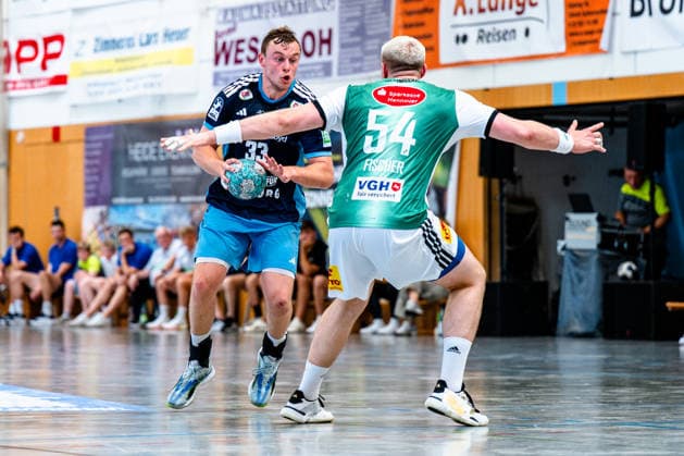 August 9, 2026, xdobgx, 2026 Heide Cup Handball Tournament, TSV Hannover Burgdorf vs. Handball Sport Verein Hamburg (Moritz Sauter), 33, on the ball, plays the ball, Justus Fischer (TSV Hannover Burgdorf), 54 Schneverdingen