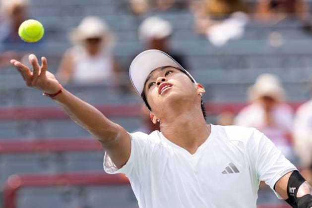 August 9, 2026, Montreal, Quebec, Canada: LEARNER TIEN (12) from USA serving in match against Thiago Agustin Tirante from Argentina in round of 16 at Canadian Open at IGA stadium in Montreal, Quebec, Canada on 2026-08-09 TENNIS: Canadian Open Montreal 2026  - ZUMAl189 20260809_zsp_l189_050 Copyright: xYannickxLegarex