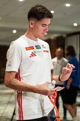 August 9, 2026: Jakob Asserson Ingebrigtsen of the Norwegian national track and field team holds a collector card at a press event ahead of the 2026 European Athletics Championships on August 9, 2026 in Birmingham. Photo by Mathias Bergeld, BILDBYRAN, code MB MB1396. athletics, friidrett, friidrotts em, em, friidretts em 2026, European Athletics Championships, press conference, event, meeting, 1, bbeng, Norway, norge, collector card  Copyright: MATHIASxBERGELD BB260809MB019