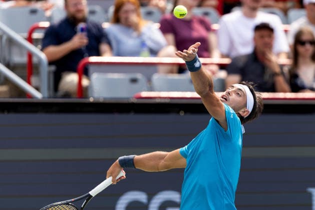 August 9, 2026, Montreal, Quebec, Canada: THIAGO AUGUSTIN TIRANTE from Argentina serving in match against Learner Tien (12) from USA in round of 16 at Canadian Open at IGA stadium in Montreal, Quebec, Canada on 2026-08-09 TENNIS: Canadian Open Montreal 2026  - ZUMAl189 20260809_zsp_l189_062 Copyright: xYannickxLegarex