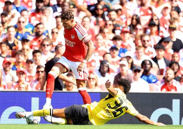 Ben White of Arsenal in action against Kaua Prates of Borussia Dortmund Arsenal v Borussia Dortmund, Pre Season Friendly, Football, Emirates Stadium, London, UK - 09 Aug 2026London Emirates Stadium United Kingdom EDITORIAL USE ONLY No use with unauthorised audio, video, data, fixture lists, club league logos or live services. Online in-match use limited to 120 images, no video emulation. No use in betting, games or single club league player publications. Copyright: xGeorgexTewkesbury Shutterstockx 17051143dr