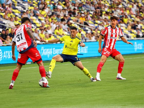August 9, 2026: Nashville SC midfielder Christian Espinoza (7) passes the ball through the legs of Atletico de San Luis defender Eduardo Aguila (31) during a Leagues Cup match between Atletico de San Luis and Nashville SC at Geodis Park in Nashville, TN. CSM Leagues Cup 2026: Atletico De San Luis Vs Nashville SC AUG 09  - ZUMAc04_ 20260809_zma_c04_078 Copyright: xStephenxFurstx