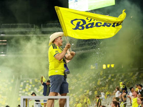 Leagues Cup 2026: Atletico De San Luis Vs Nashville SC AUG 09 August 9, 2026: A fan waves a flag in celebration after a goal is scored during a Leagues Cup match between Atletico de San Luis and Nashville SC at Geodis Park in Nashville, TN. Stephen Furst CSM (Credit Image: Â Stephen Furst Cal Media) Nashville Tn United States of America EDITORIAL USE ONLY Copyright: xx ZUMA-20260809_zma_c04_113.jpg StephenxFurstx csmphotothree510411