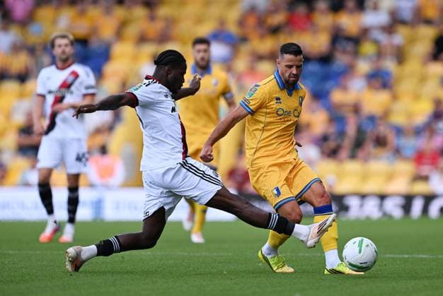 Femi Seriki of Sheffield United and Stephen McLaughlin of Mansfield Town Mansfield Town v Sheffield United, EFL Carabao Cup, First Round, Football, One Call Stadium, Mansfield, UK - 09 Aug 2026Mansfield One Call Stadium United Kingdom EDITORIAL USE ONLY No use with unauthorised audio, video, data, fixture lists, club league logos or live services. Online in-match use limited to 120 images, no video emulation. No use in betting, games or single club league player publications. Copyright: xAnnaxGowthorpe Shutterstockx 17051191bh