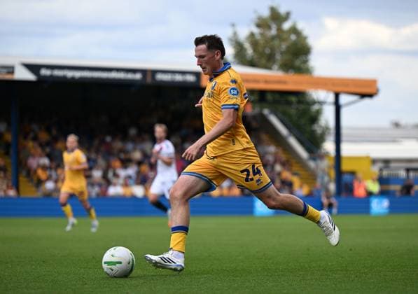 Regan Hendry of Mansfield Town Mansfield Town v Sheffield United, EFL Carabao Cup, First Round, Football, One Call Stadium, Mansfield, UK - 09 Aug 2026Mansfield One Call Stadium United Kingdom EDITORIAL USE ONLY No use with unauthorised audio, video, data, fixture lists, club league logos or live services. Online in-match use limited to 120 images, no video emulation. No use in betting, games or single club league player publications. Copyright: xAnnaxGowthorpe Shutterstockx 17051191cw