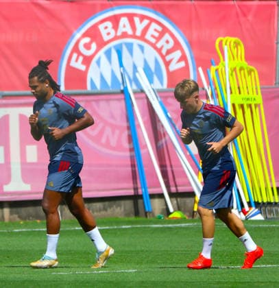 August 10, 2026, FC Bayern Training, Saebenerstrasse, Munich, Soccer, Sports, Pictured: Serge Gnabry of FC Bayern Munich and Lennart Karl of FC Bayern Munich