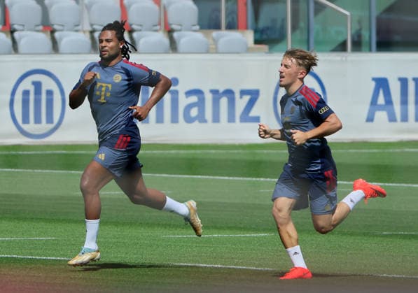 August 10, 2026, FC Bayern Training, Saebenerstrasse, Munich, Soccer, Sports, Pictured: Serge Gnabry of FC Bayern Munich and Lennart Karl of FC Bayern Munich