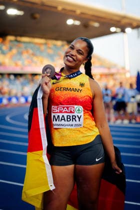 European Athletics Championships, Birmingham, August 10, 2026: Yemisi Mabry of Germany celebrates with her medal and flag at the 2026 European Athletics Championships in Birmingham Copyright: xBEAUTIFULxSPORTS Flatemerschx