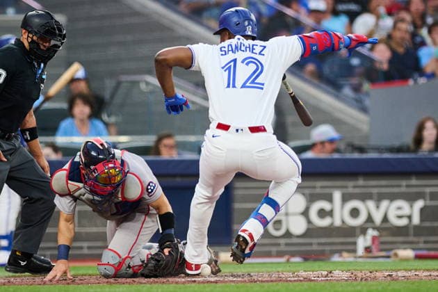 August 10, 2026, Toronto, On, Canada: Toronto Blue Jays Jesus Sanchez (12) is hit by a pitch from Boston Red Sox s Sonny Gray (54), during fourth inning MLB, Baseball Herren, USA baseball action in Toronto, on Monday, Aug. 10, 2026. Canada News - August 10, 2026 - ZUMAc35_ 20260810_zaf_c35_095 Copyright: xSammyxKoganx