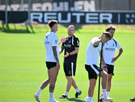 August 11, 2026, Mönchengladbach Soccer, Men s Team, 2026–2027 Season, Borussia Mönchengladbach Training: In conversation (from left) Tomas Cvancara (Gladbach), Eugen Polanski (Gladbach coach); to the right of them, Nico Elvedi (Gladbach), second from right, Joe Scally (Gladbach), right. DFL regulations prohibit any use of photographs as image sequences and or quasi-video content. Borussia Park, North Rhine-Westphalia, Germany