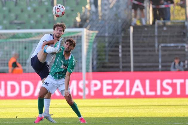 August 26, 2026, GER, Regionalliga Nord, Soccer, Matchday 1, 2026–2027 Season, Dietmar Scholze Stadium an der Lohmuehle, VfB Lübeck vs. VfB Oldenburg: Marc Schröder (VfB Oldenburg 20) in a tackle against Dardan Karimani (VfB Lübeck 10). Photo: nordphoto GmbH, Tauchnitz, Lübeck, Dietmar Scholze Stadium an der Lohmuehle, SH, Germany Copyright: xnordphotoxGmbHx xTauchnitzx