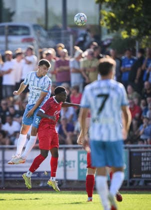 Soccer WFV Cup 2026–2027, Round 3, August 11, 2026: FC Rottenburg vs. SV Stuttgarter Kickers—Vincent Schwab (left, Kickers) vs. Ruben Nyanga (center, FC Rottenburg)