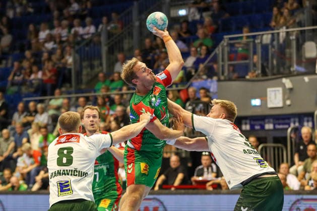 August 11, 2026, xgox, 2026 Hummel Cup Handball Match: SC Magdeburg vs. GWD Mindenemspor, from left: Albin Lagergren (Magdeburg), 21 shots on goal, goal scorer, scores a goal, Magdeburg