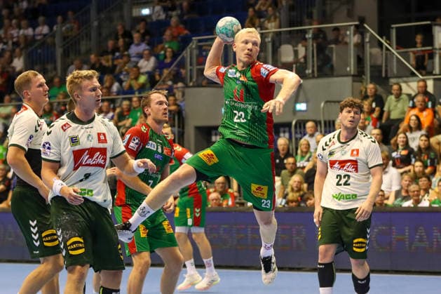 August 11, 2026, xgox, Handball Hummel Cup 2026 SC Magdeburg vs. GWD Mindenemspor, from left: Magnus Saugstrup (Magdeburg), 23 shots on goal, goal scorer, scores a goal, Magdeburg