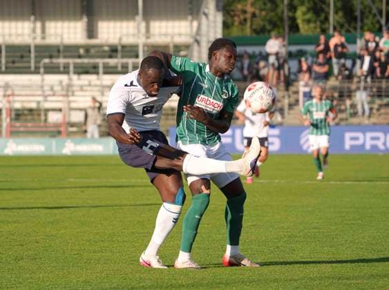 Photo: Anouar ADAM (Oldenburg) vs. Emmanuel APPIAH (Lübeck), right—Regionalliga Nord soccer match, Tue, Aug 11, 2026, VfB Lübeck vs. VfB Oldenburg