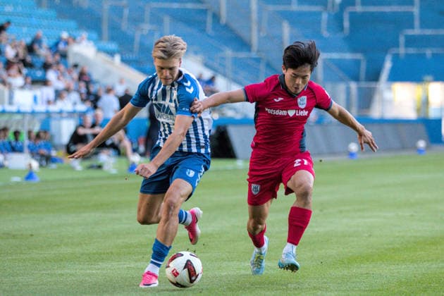 August 11, 2026 Men s Soccer 2026–2027 Northeast Regional League, Matchday 4: 1 FC Magdeburg II vs. SV Babelsberg 03, Avnet Arena, Magdeburg; Cornelius Bräunling (Magdeburg, 29, blue and white, in a footrace with Min Gi Kang of Babelsberg, 21, red; Magdeburg, Saxony-Anhalt, Germany