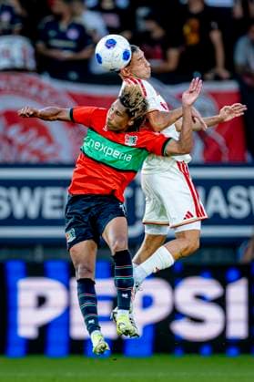 NIJMEGEN: Olympiacos Piraeus midfielder Santiago HGezze and NEC Nijmegen midfielder Noe Lebreton during the Champions League match between NEC and Olympiacos at De Goffert Stadium on August 11, 2026, in Nijmegen, the Netherlands