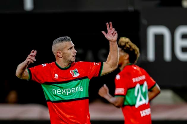 NIJMEGEN N E C Nijmegen forward Bryan Linssen celebrates his goal during the Champions League match between N E C and Olympiacos at Stadion de Goffert on August 11, 2026, in Nijmegen, the Netherlands