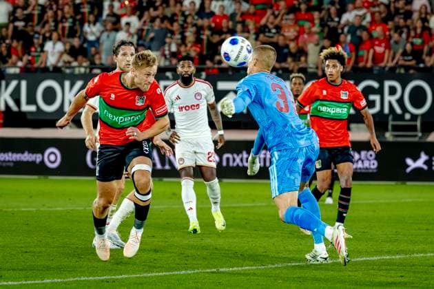 NIJMEGEN N E C Nijmegen forward Kaj Sierhuis scores the 2-1 goal, but it is ruled offside during the Champions League match between N E C and Olympiacos at Stadion de Goffert on August 11, 2026, in Nijmegen, the Netherlands